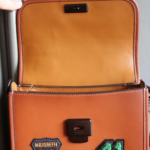 NWT Rogue Top Handle in Signature Textile Jacuard with Varsity Patches. - Picture 10 of 14